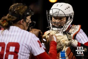 Nebraska catcher Jesse Ferrell (25) hypes up her team before heading out to play defense against UCLA during a college softball game on Mar. 27, 2026, in Lincoln, Nebraska. Photo by Braden Cochran.