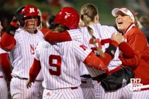 Nebraska Huskers celebrate a home run hit by batter Hannah Camenzind (9) during a college softball game against UCLA, Mar. 27, 2026, Lincoln, Nebraska. Photo by Braden Cochran.