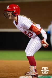 Nebraska Cornhusker Hannah Coor (23) celebrates after a base hit to first base during a college softball game against UCLA, Mar. 27, 2026, Lincoln, Nebraska. Photo by Braden Cochran.