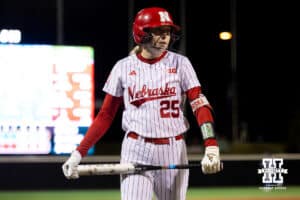 Nebraska Cornhusker batter Jesse Farrell (25) walks up to the plate for her next attempt at bat during a college softball game against UCLA, Mar. 27, 2026, Lincoln, Nebraska. Photo by Braden Cochran.
