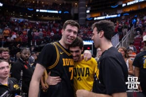 Iowa Hawkeye forward Alvaro Folgueiras (7) celebrates after their win over the Huskers during the Sweet Sixteen of the NCAA Men’s Basketball Championship on Thursday, March 26, 2026, in Houston. Photo by John S. Peterson.