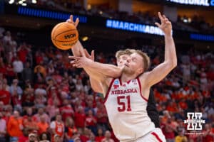 Nebraska Cornhusker forward Rienk Mast (51) reaches for the ball against Iowa Hawkeye forward Cooper Koch (8) in the second half during the Sweet Sixteen of the NCAA Men’s Basketball Championship on Thursday, March 26, 2026, in Houston. Photo by John S. Peterson.