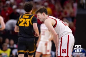 Nebraska Cornhusker forward Pryce Sandfort (21) hurting after going after the ball against the Iowa Hawkeyes during the Sweet Sixteen of the NCAA Men’s Basketball Championship on Thursday, March 26, 2026, in Houston. Photo by John S. Peterson.