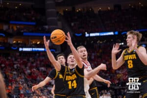 Iowa Hawkeye guard Bennett Stirtz (14) comes up with the rebound against the Nebraska Cornhuskers in the second half during the Sweet Sixteen of the NCAA Men’s Basketball Championship on Thursday, March 26, 2026, in Houston. Photo by John S. Peterson.