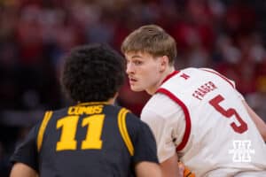 Nebraska Cornhusker forward Braden Frager (5) dribbles the ball against Iowa Hawkeye guard Kael Combs (11) in the second half during the Sweet Sixteen of the NCAA Men’s Basketball Championship on Thursday, March 26, 2026, in Houston. Photo by John S. Peterson.