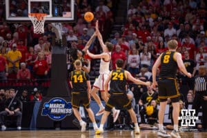 Nebraska Cornhusker forward Pryce Sandfort (21) makes a jumpshot against the Iowa Hawkeyes in the first half during the Sweet Sixteen of the NCAA Men’s Basketball Championship on Thursday, March 26, 2026, in Houston. Photo by John S. Peterson.