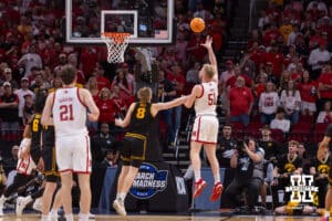 Nebraska Cornhusker forward Rienk Mast (51) makes a basket over Iowa Hawkeye forward Cooper Koch (8) in the first half during the Sweet Sixteen of the NCAA Men’s Basketball Championship on Thursday, March 26, 2026, in Houston. Photo by John S. Peterson.