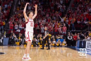 Nebraska Cornhusker forward Pryce Sandfort (21) gets the Husker fans fired up after making a three point basket against the Iowa Hawkeyes in the first half during the Sweet Sixteen of the NCAA Men’s Basketball Championship on Thursday, March 26, 2026, in Houston. Photo by John S. Peterson.