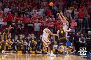 Nebraska Cornhusker forward Pryce Sandfort (21) makes a three point basket from the corner against the Iowa Hawkeyes during the Sweet Sixteen of the NCAA Men’s Basketball Championship on Thursday, March 26, 2026, in Houston. Photo by John S. Peterson.