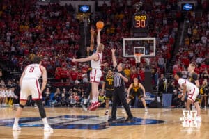 Nebraska Cornhusker forward Rienk Mast (51) wins the tipoff against the Iowa Hawkeyes during the Sweet Sixteen of the NCAA Men’s Basketball Championship on Thursday, March 26, 2026, in Houston. Photo by John S. Peterson.