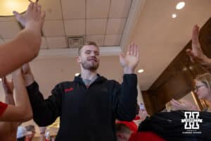 Nebraska Cornhusker forward Rienk Mast gives high fives heading to the bus at the hotel to take on Iowa during the Sweet Sixteen of the NCAA Men’s Basketball Championship on Thursday, March 26, 2026, in Houston. Photo by John S. Peterson.