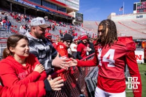 Nebraska Cornhusker quarterback TJ Lateef (14) gives the fans five during the Spring Game on Saturday, March 28, 2026, in Lincoln. Photo by John S. Peterson.