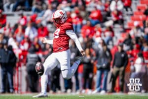 Nebraska Cornhusker punter Archie Wilson (83) pubts during the spring game on March 28, 2026, in Lincoln, Nebraska. Photo by Brandon Tiedemann