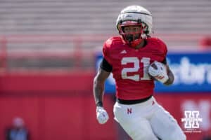 Nebraska Cornhusker DUPLICATE*** running back Kwinten Ives (21) rushes during the spring game on March 28, 2026, in Lincoln, Nebraska. Photo by Brandon Tiedemann