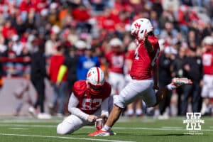 Nebraska Cornhusker place kicker Michael Sarikizis (84) kicks an extra point during the Spring Game on Saturday, March 28, 2026, in Lincoln. Photo by John S. Peterson.