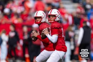 Nebraska Cornhusker quarterbacks Anthony Colandrea (10) and TJ Lateef (14) drop back to pass, warming up for the Spring Game on Saturday, March 28, 2026, in Lincoln. Photo by John S. Peterson.