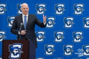 Creighton Bluejay head coach in waiting Alan Huss talks during his introductory press conference on March 25, 2026, in Omaha, Nebraska. Photo by Brandon Tiedemann