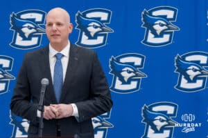 Creighton Bluejay head coach in waiting Alan Huss talks during his introductory press conference on March 25, 2026, in Omaha, Nebraska. Photo by Brandon Tiedemann