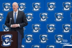 Creighton Bluejay head coach in waiting Alan Huss talks during his introductory press conference on March 25, 2026, in Omaha, Nebraska. Photo by Brandon Tiedemann