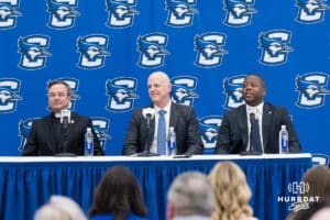 Creighton Bluejay head coach in waiting Alan Huss sits during his introductory press conference on March 25, 2026, in Omaha, Nebraska. Photo by Brandon Tiedemann