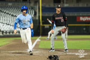 Creighton Bluejay Nate McHugh (5) steals home during a college baseball game against Omaha on March 24, 2026, in Omaha, Nebraska. Photo by Brandon Tiedemann