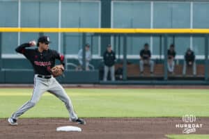 Omaha Maverick Chase Diggins (8) throws to first during a college baseball game against Creighton on March 24, 2026, in Omaha, Nebraska. Photo by Brandon Tiedemann
