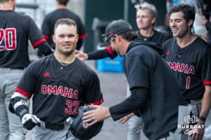 Omaha Maverick Nick Riggs (32) celebrates his three run home run during a college baseball game against Creighton on March 24, 2026, in Omaha, Nebraska. Photo by Brandon Tiedemann