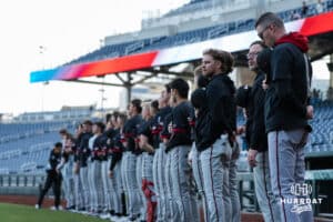 Omaha Mavericks stand for the national anthem during a college baseball game against Creighton on March 24, 2026, in Omaha, Nebraska. Photo by Brandon Tiedemann