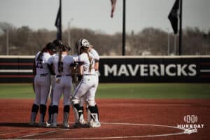 Omaha Mavericks gather at the mound against the North Dakota State Bison during a softball game at Connie Clausen Field on Friday, March 20, 2026, in Omaha, Nebraska. Photo by Collin Stilen.