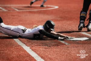 Omaha Maverick slides into home plate against the North Dakota State Bison during a softball game at Connie Clausen Field on Friday, March 20, 2026, in Omaha, Nebraska. Photo by Collin Stilen.