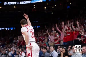 Nebraska Cornhusker guard Cale Jacobsen (31) celebrates making three point basket against the Troy Trojans in the second half during the first round of the NCAA Men’s Basketball Championship on Thursday, March 19, 2026, in Oklahoma City. Photo by John S. Peterson.