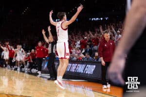 Nebraska Cornhusker forward Pryce Sandfort (21) celebrates making a three point basket against the Troy Trojans in the first half during the first round of the NCAA Men’s Basketball Championship on Thursday, March 19, 2026, in Oklahoma City. Photo by John S. Peterson.