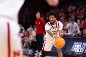Nebraska Cornhusker guard Jamarques Lawrence (10) makes a pass against the Troy Trojans in the first half during the first round of the NCAA Men’s Basketball Championship on Thursday, March 19, 2026, in Oklahoma City. Photo by John S. Peterson.