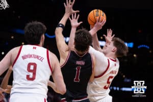 Nebraska Cornhusker forward Braden Frager (5) crashes in for a lay up against the Troy Trojans in the first half during the first round of the NCAA Men’s Basketball Championship on Thursday, March 19, 2026, in Oklahoma City. Photo by John S. Peterson.
