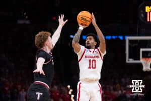 Nebraska Cornhusker guard Jamarques Lawrence (10) makes a three point basket against the Troy Trojans in the first half during the first round of the NCAA Men’s Basketball Championship on Thursday, March 19, 2026, in Oklahoma City. Photo by John S. Peterson.