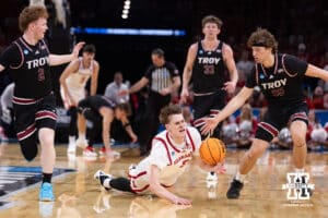 Nebraska Cornhusker forward Braden Frager (5) gets tripped up dribbling the ball a during the first round of the NCAA Men’s Basketball Championship on Thursday, March 19, 2026, in Oklahoma City. Photo by John S. Peterson.