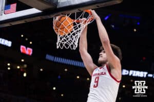 Nebraska Cornhusker forward Berke Büyüktuncel (9) dunks the ball against the Troy Trojans during the first round of the NCAA Men’s Basketball Championship on Thursday, March 19, 2026, in Oklahoma City. Photo by John S. Peterson.