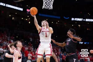 Nebraska Cornhusker guard Sam Hoiberg (1) makes a lay up against Troy Trojans during the first round of the NCAA Men’s Basketball Championship on Thursday, March 19, 2026, in Oklahoma City. Photo by John S. Peterson.