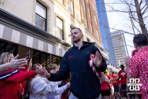 Nebraska Cornhusker forward Rienk Mast (51) walks to the bus while giving fives to the fans during the first round of the NCAA Men’s Basketball Championship on Thursday, March 19, 2026, in Oklahoma City. Photo by John S. Peterson.