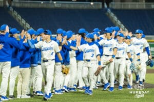 Creighton Bluejays high five after a college baseball game against Omaha on March 18, 2026, in Omaha, Nebraska. Photo by Brandon Tiedemann