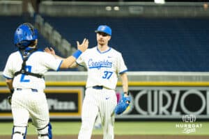 Creighton Bluejays Connor Capece (2) and JT Adams (37) celebrate the win during a college baseball game against Omaha on March 18, 2026, in Omaha, Nebraska. Photo by Brandon Tiedemann