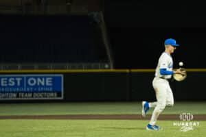 Creighton Bluejay Nick Bowron (10) runs onto the field during a college baseball game against Omaha on March 18, 2026, in Omaha, Nebraska. Photo by Brandon Tiedemann