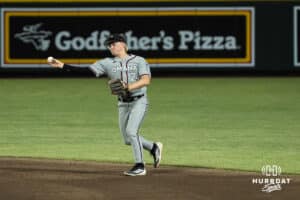 Omaha Maverick Ian Koosman (24) throws to first during a college baseball game against Creighton on March 18, 2026, in Omaha, Nebraska. Photo by Brandon Tiedemann