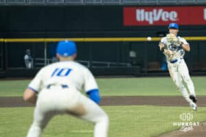 Creighton Bluejay Joe Washburn (1) throws to first during a college baseball game against Omaha on March 18, 2026, in Omaha, Nebraska. Photo by Brandon Tiedemann