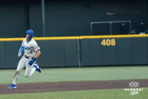 Creighton Bluejay Teddy Deters (4) rounds the base during a college baseball game against Omaha on March 18, 2026, in Omaha, Nebraska. Photo by Brandon Tiedemann