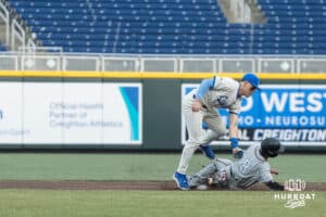 Omaha Maverick Chase Diggins (8) steals during a college baseball game against Creighton on March 18, 2026, in Omaha, Nebraska. Photo by Brandon Tiedemann