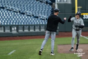 Omaha Maverick Hayden Lewis (34) celebrates his home-run during a college baseball game against Creighton on March 18, 2026, in Omaha, Nebraska. Photo by Brandon Tiedemann