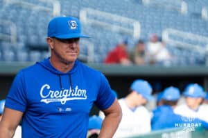 Creighton Bluejay head coach Mark Kingston waits for the umpires before a college baseball game against Creighton or Omaha on March 18, 2026, in Omaha, Nebraska. Photo by Brandon Tiedemann