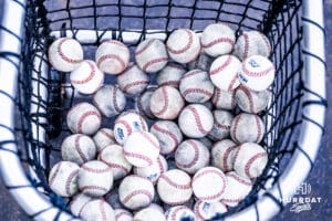 Creighton Bluejay baseballs sit in the bin before a college baseball game against Omaha on March 18, 2026, in Omaha, Nebraska. Photo by Brandon Tiedemann