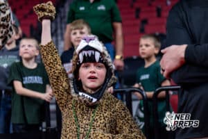 A young Howells-Dodge fan is celebrating after the Jaguars won a high school state championship basketball game against McCool Junction on March 14, 2026 in Lincoln, Nebraska. Photo By Jack Stephens.